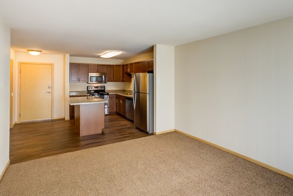 Spacious living room with contemporary decor in Eagles Landing Apartments