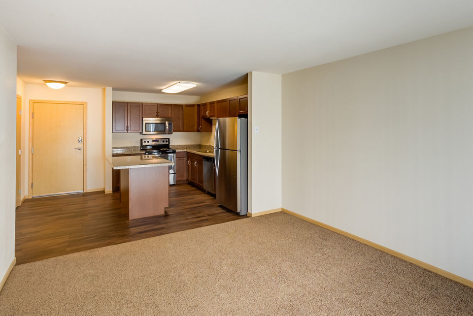 Spacious living room with contemporary decor in Eagles Landing Apartments