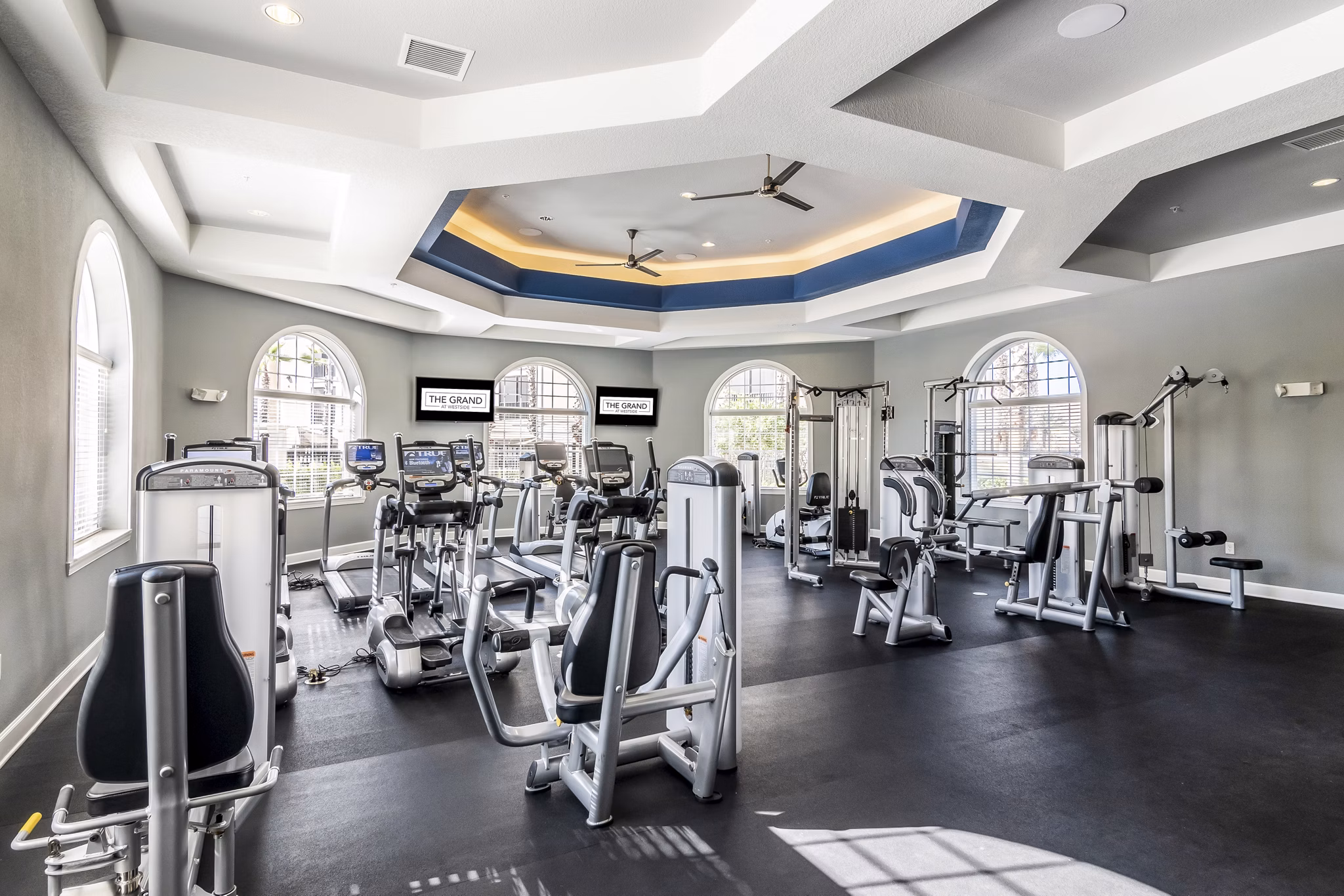 fitness center at The Grand at Westside Apartments 