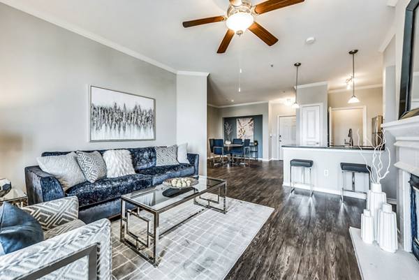 living room at Midtown at Camp Springs Apartments