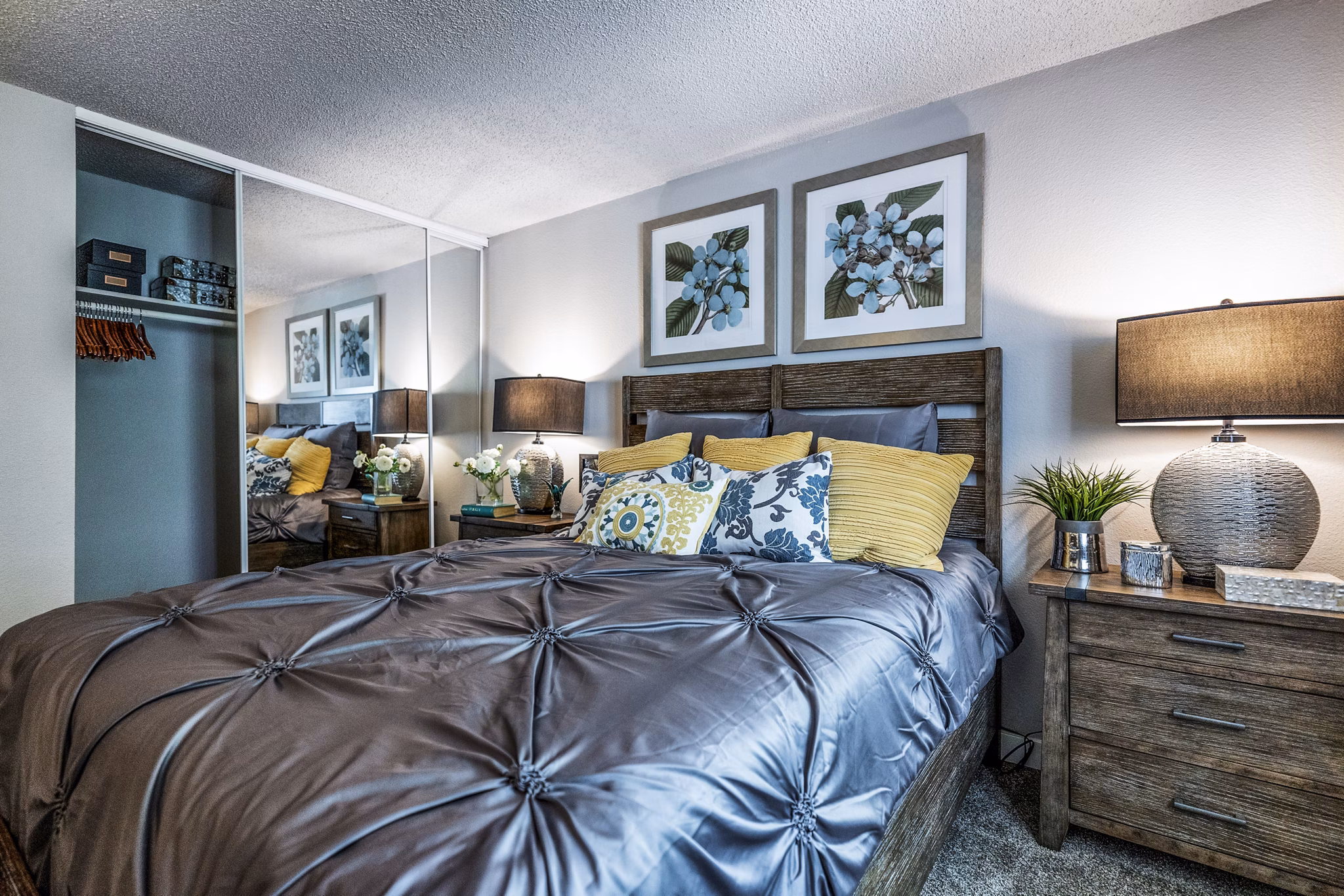 The Alden Apartments: Stylish bedroom with modern decor and large windows