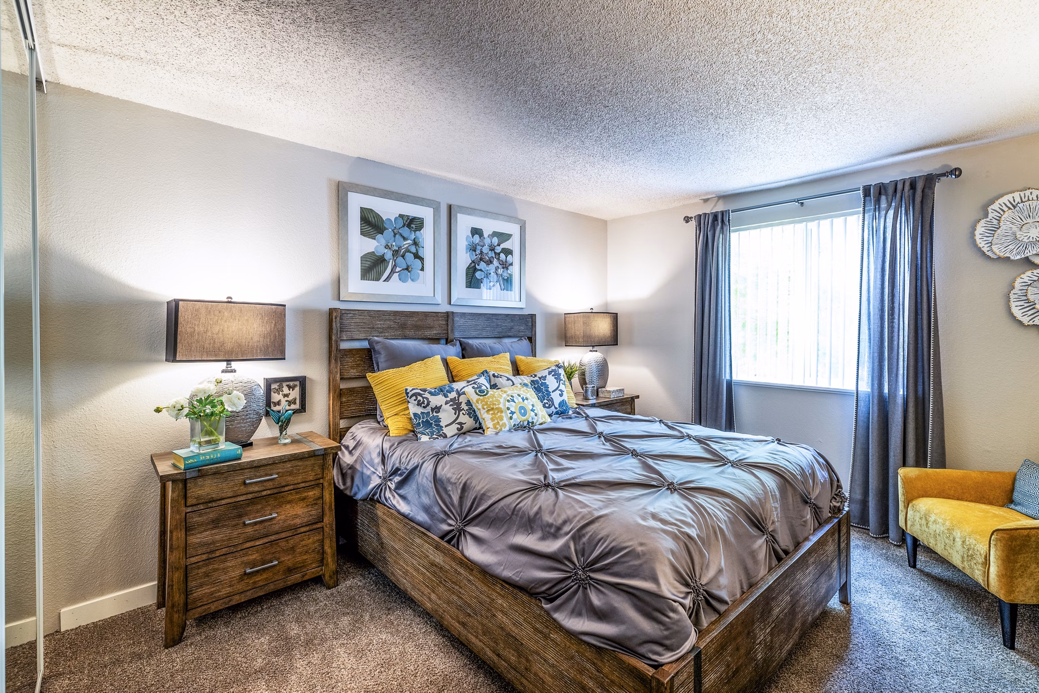 Cozy bedroom featuring modern design elements in The Alden Apartments, Greystar luxury rental community