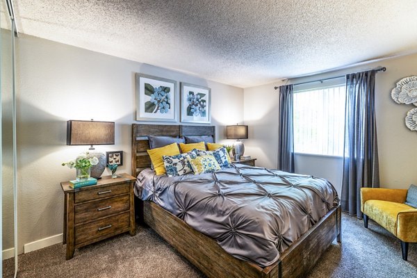 Cozy bedroom featuring modern design elements in The Alden Apartments, Greystar luxury rental community