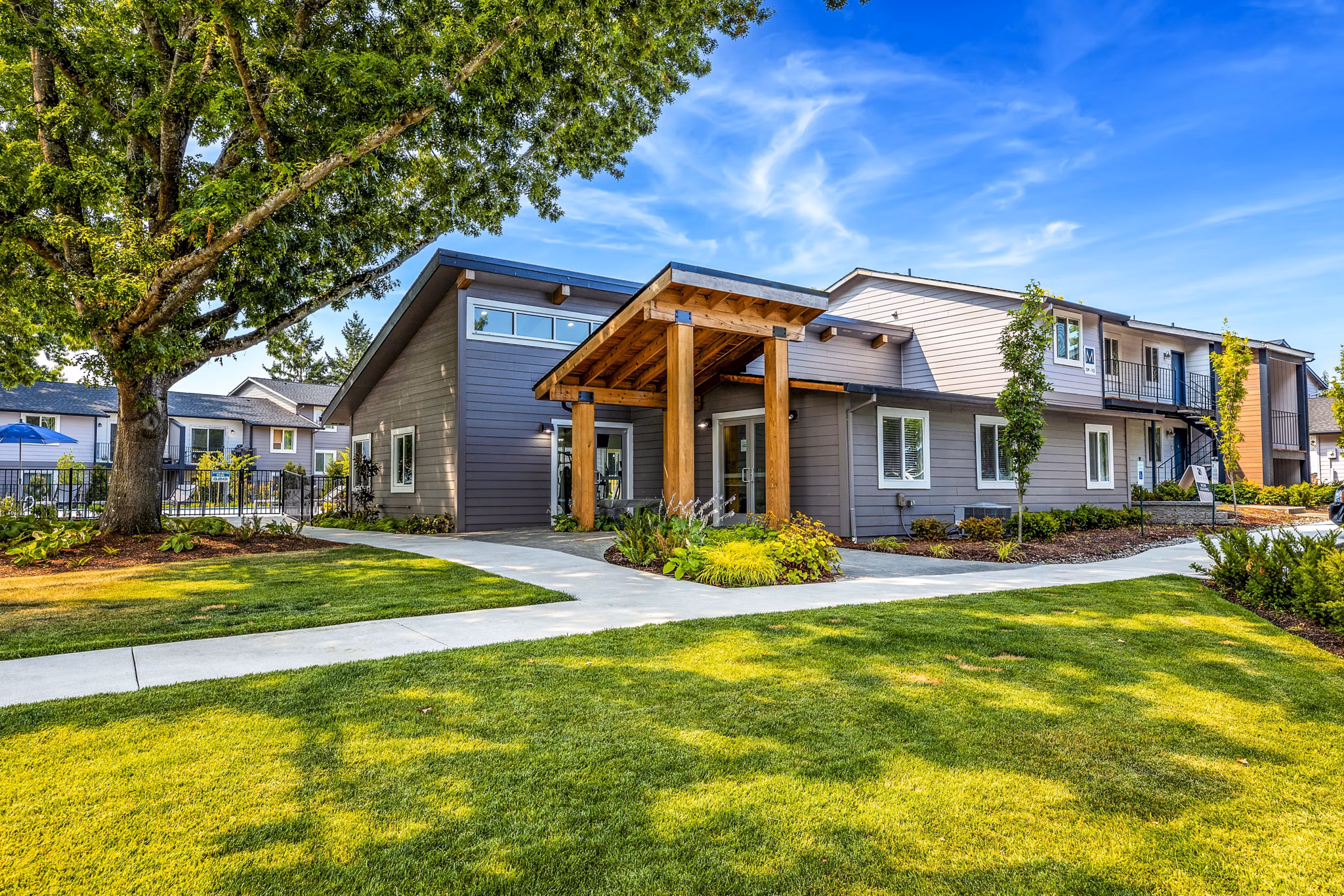 The Alden Apartments: Modern clubhouse and leasing office with community spaces