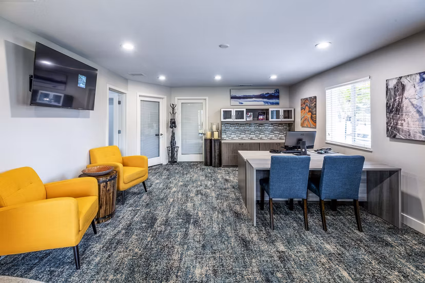 The Alden Apartments: Modern clubhouse and leasing office with contemporary design elements in a vibrant community setting