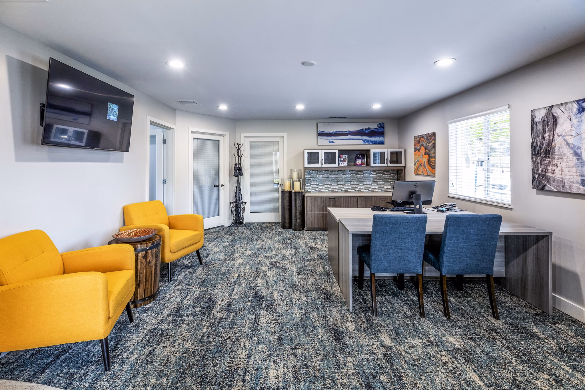 The Alden Apartments: Modern clubhouse and leasing office with contemporary design elements in a vibrant community setting