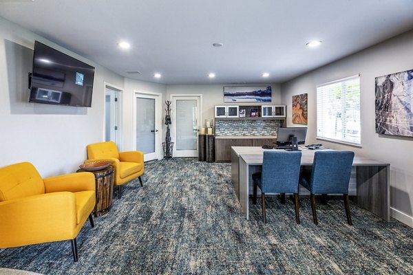 The Alden Apartments: Modern clubhouse and leasing office with contemporary design elements in a vibrant community setting