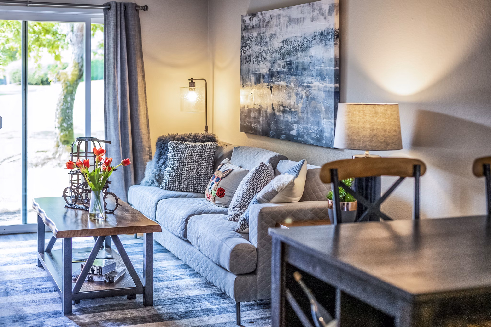 Modern living room with elegant furnishings at The Alden Apartments offering luxury lifestyle amenities