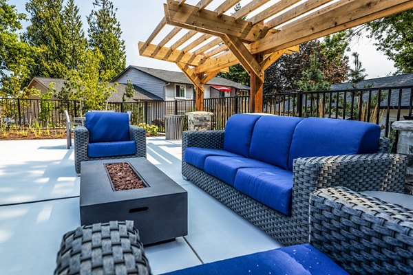 Outdoor seating with a fire pit at The Alden Apartments, Greystar luxury community
