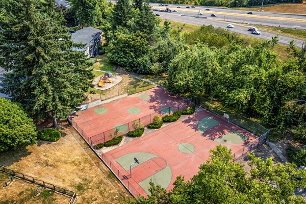 Sport courts at The Alden Apartments offering tennis and basketball facilities for residents in a vibrant community setting