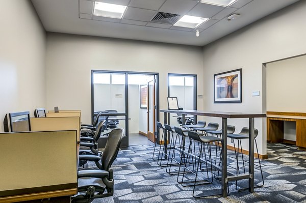 Meeting room with advanced tech at 2116 Chestnut Apartments, offering a versatile space for business and community events