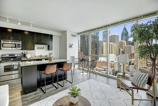 Dining room featuring modern furniture and elegant lighting in 2116 Chestnut Apartments, luxury living at its finest