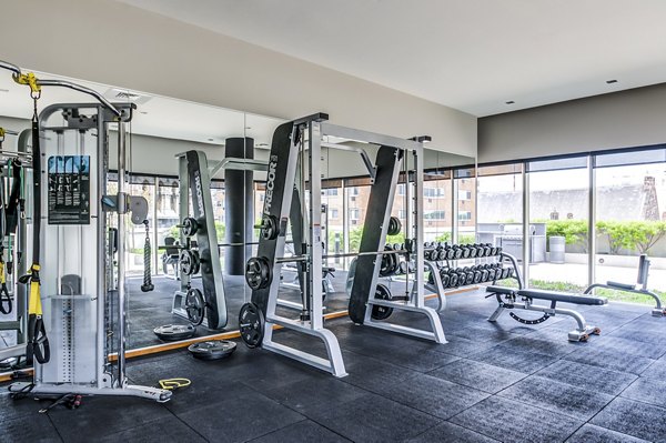 State-of-the-art fitness center at 2116 Chestnut Apartments, featuring modern equipment for luxury living and wellness experiences