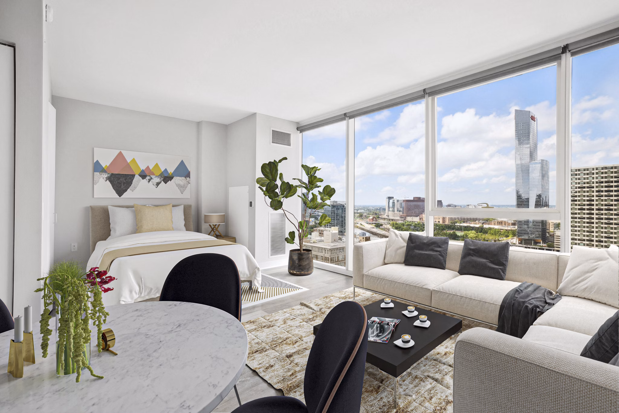 studio bed and living room at 2116 Chestnut Apartment