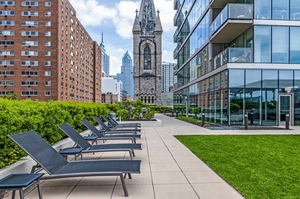 Spacious patio with stylish seating at 2116 Chestnut Apartments in luxury living setup