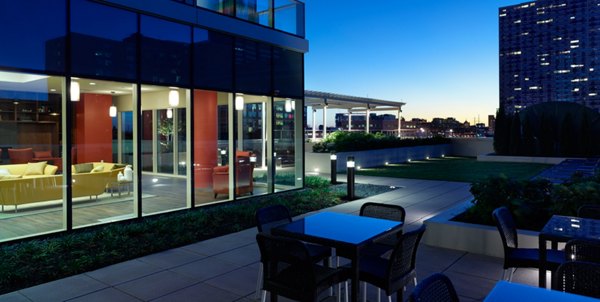 Inviting recreational area with seating and green spaces at 2116 Chestnut Apartments