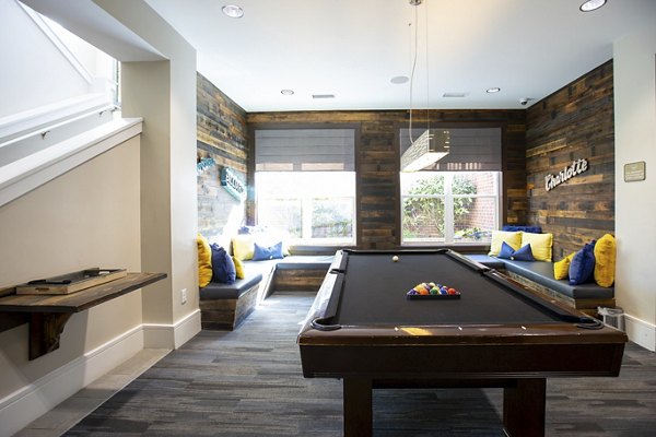 Clubhouse featuring modern design elements at Residences at Brookline Apartments, creating an inviting social space