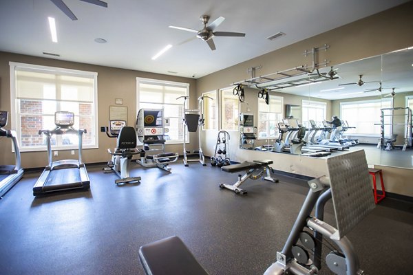 Modern fitness center with state-of-the-art equipment at Residences at Brookline Apartments