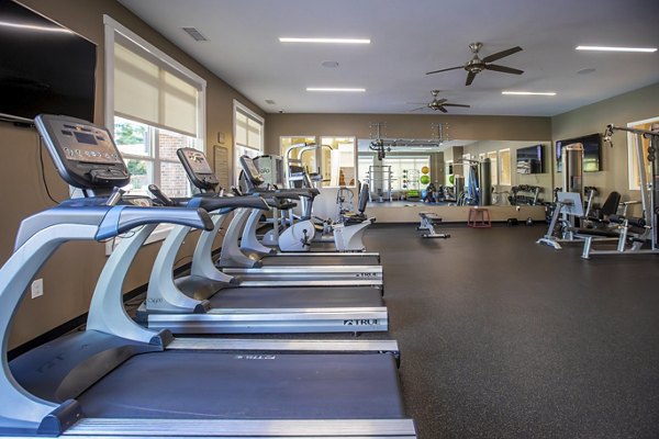 Fitness center with modern equipment at Residences at Brookline Apartments