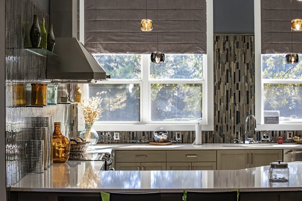 Modern kitchen with stainless steel appliances at Residences at Brookline Apartments