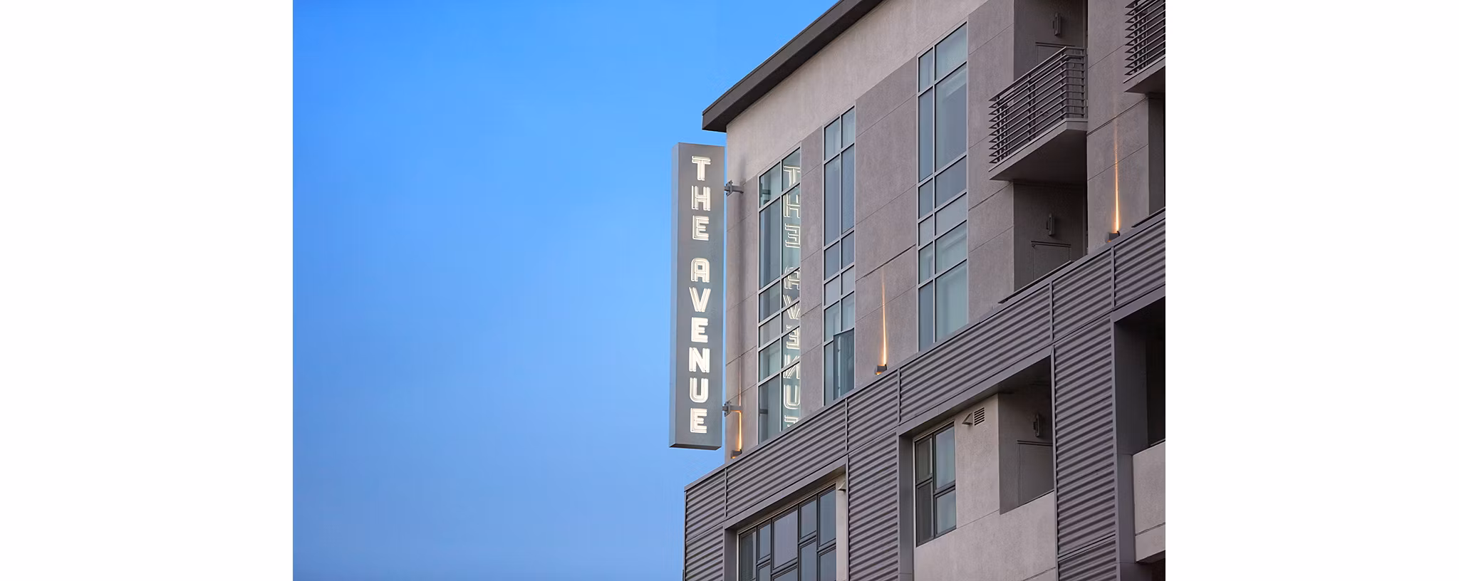 Signage at The Avenue Hollywood Apartments, luxury living in vibrant Los Angeles neighborhood