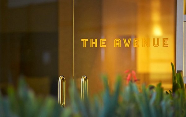 The Avenue Hollywood Apartments: Modern signage at luxury apartments in Los Angeles