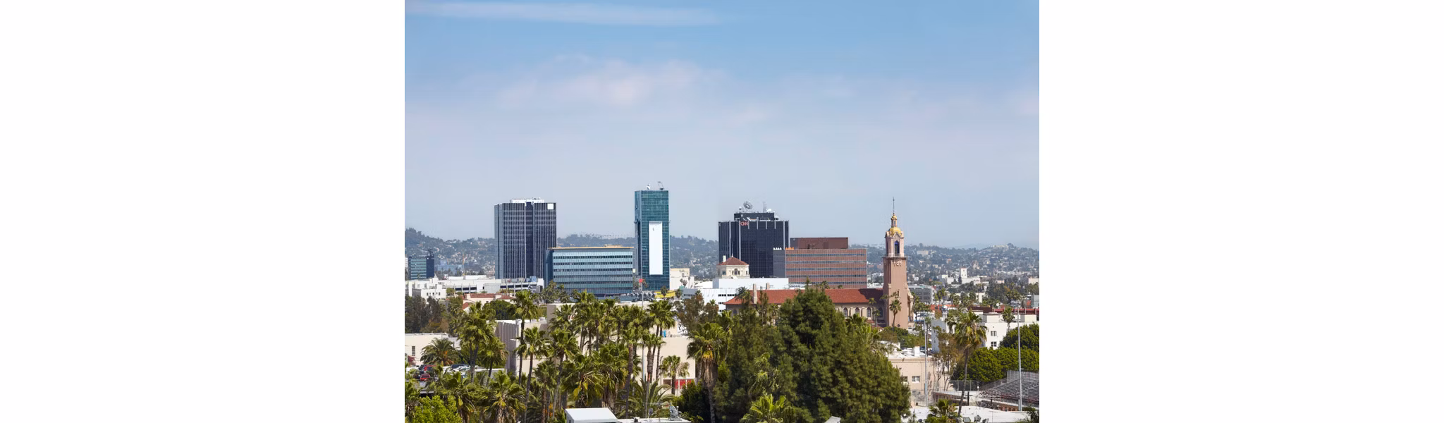 The Avenue Hollywood Apartments: Scenic view from a luxury high-rise balcony showcasing city lights and skyline