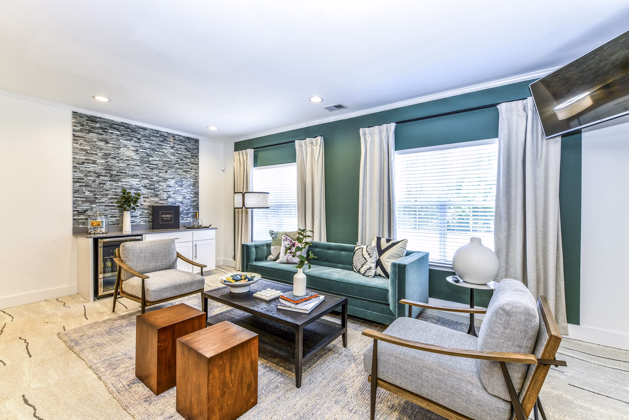 Clubhouse at Avana Kennesaw Apartments featuring modern design and seating areas