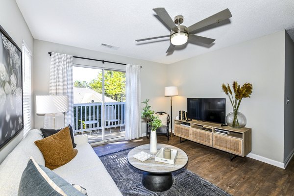 Living room with plush seating and modern decor at Avana Kennesaw Apartments: Luxury living for a stylish lifestyle