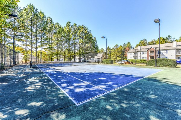 Sport court at Avana Kennesaw: Modern facility for residents offering basketball and tennis options