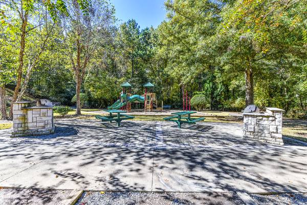 grill area/playground at Avana Kennesaw Apartments