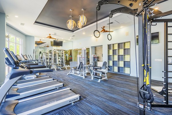 Modern fitness center with state-of-the-art equipment at Presley Uptown Apartments