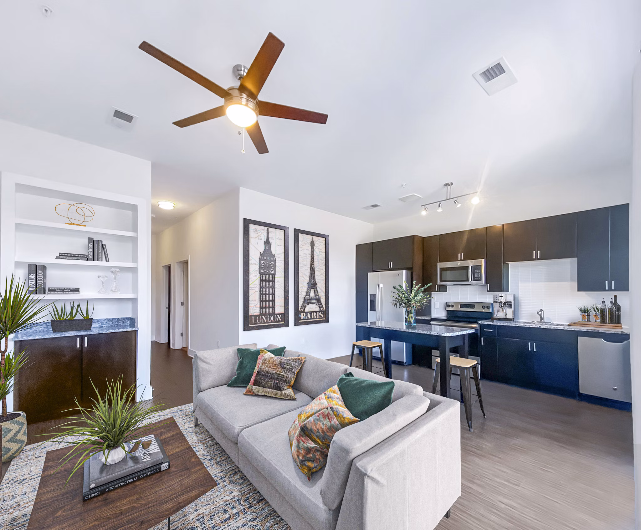 Spacious living room with modern decor in Presley Uptown Apartments, luxury residence