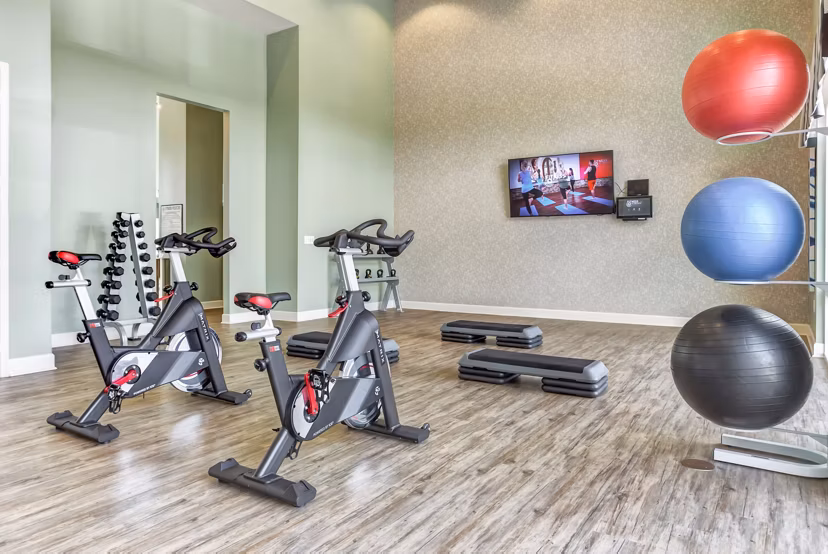 Fitness center with modern equipment at Atlantic at Parkridge Apartments