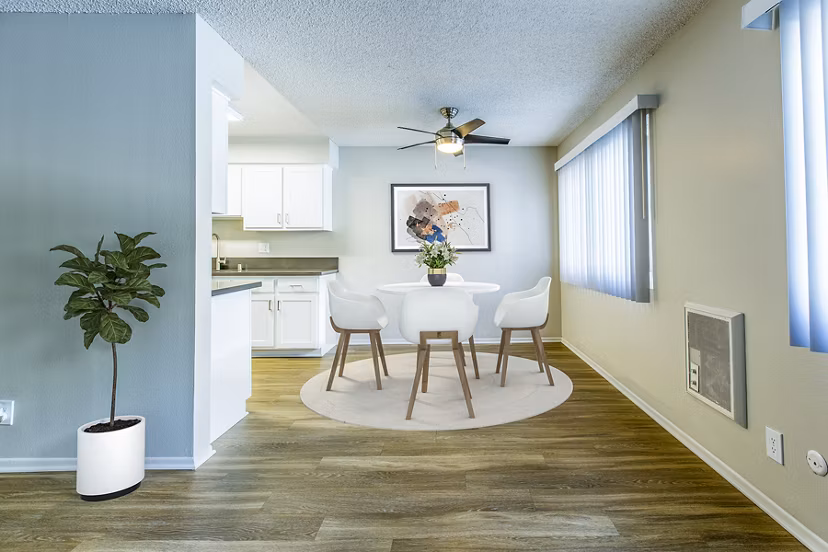Madrid Apartments: Elegant dining room with modern furnishings in luxury complex