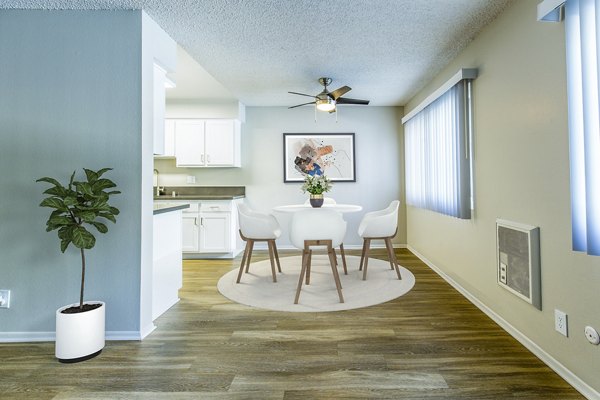 Madrid Apartments: Elegant dining room with modern furnishings in luxury complex