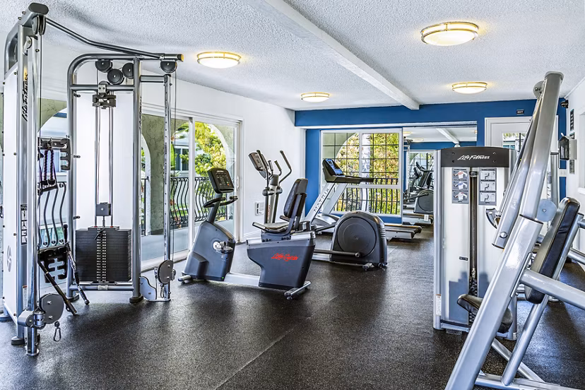 Fitness center with state-of-the-art equipment at Madrid Apartments