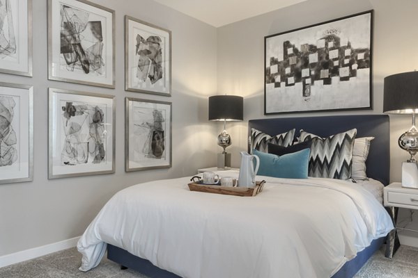 Luxurious bedroom with modern decor at Altana Apartments