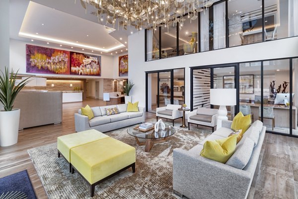 Modern clubhouse at Altana Apartments with stylish lounge areas and contemporary design