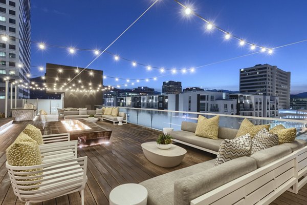 Stunning rooftop deck with city views at Altana Apartments