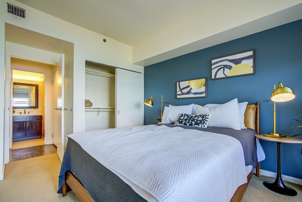 The Towers at Rincon: Elegant bedroom with city views in Greystar's luxury apartments
