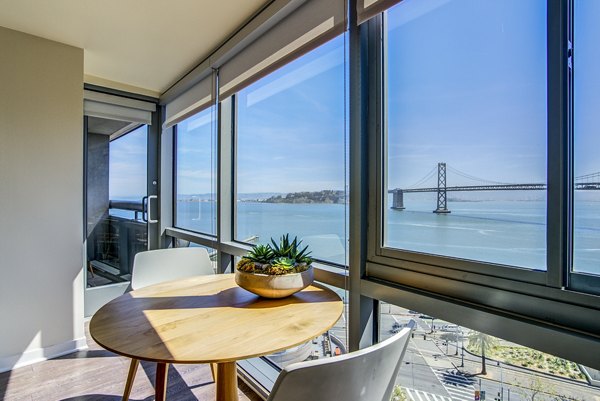 Dining room with elegant furnishings at The Towers at Rincon Apartments