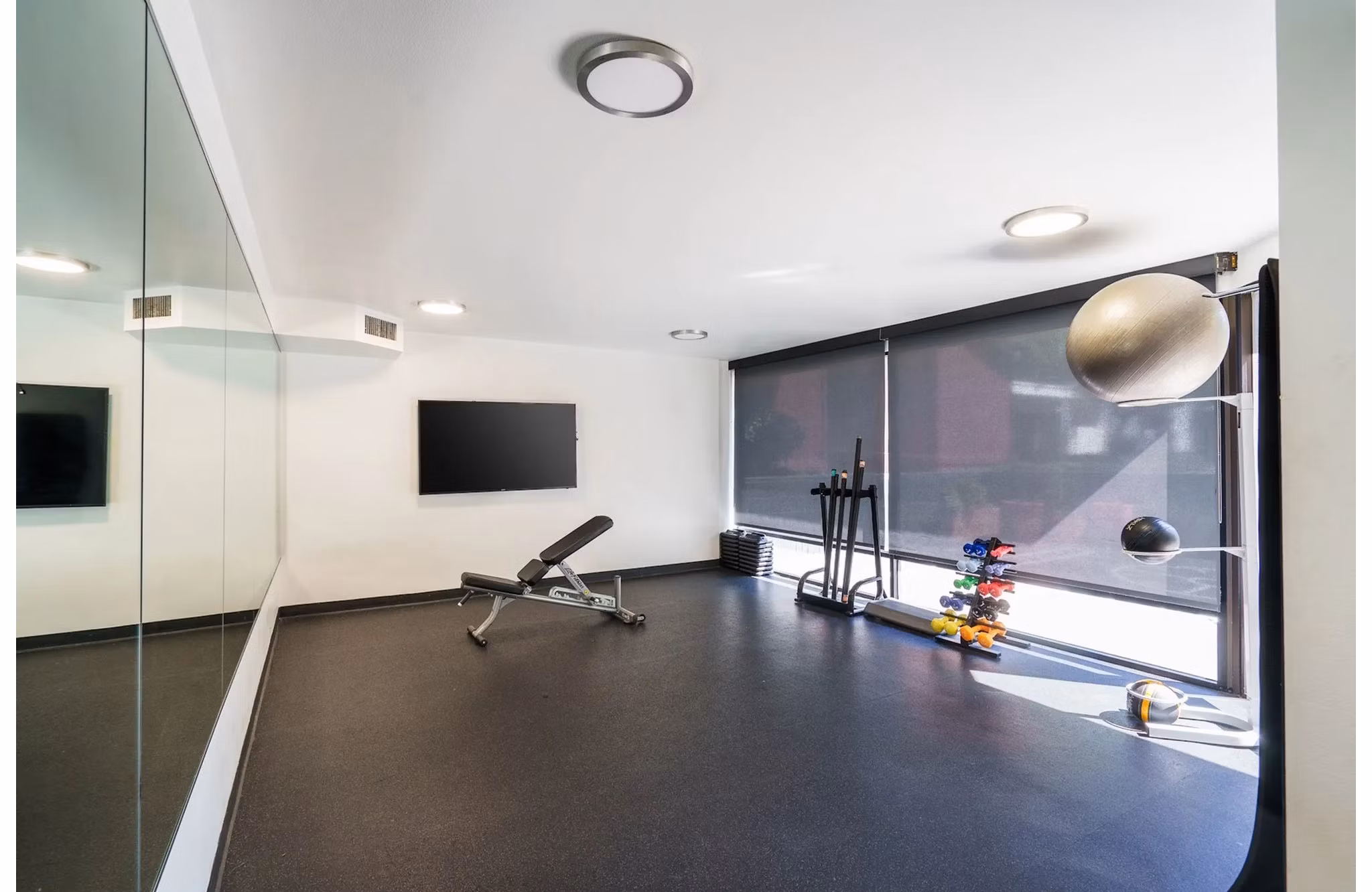 fitness center at Creekwood Apartments