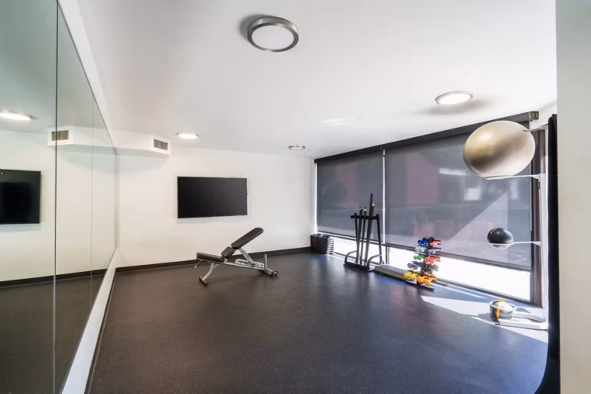 fitness center at Creekwood Apartments