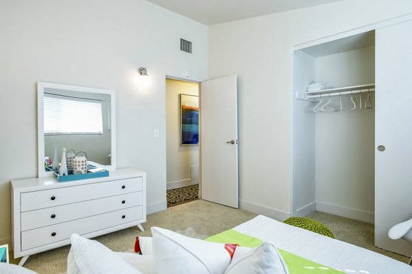 Cozy bedroom with modern decor at Arbors at Antelope Apartments, luxury living spaces designed for comfort
