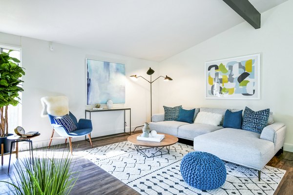 Spacious living room with stylish decor at Arbors at Antelope Apartments, offering comfort and elegance in modern apartment living