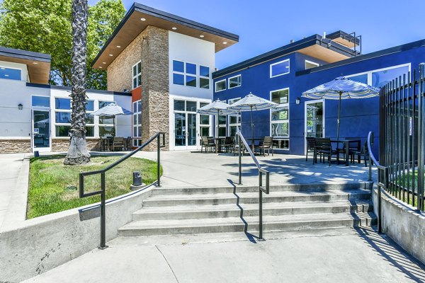 Patio with cozy seating at Arbors at Antelope Apartments, ideal for relaxation in a luxurious Greystar community