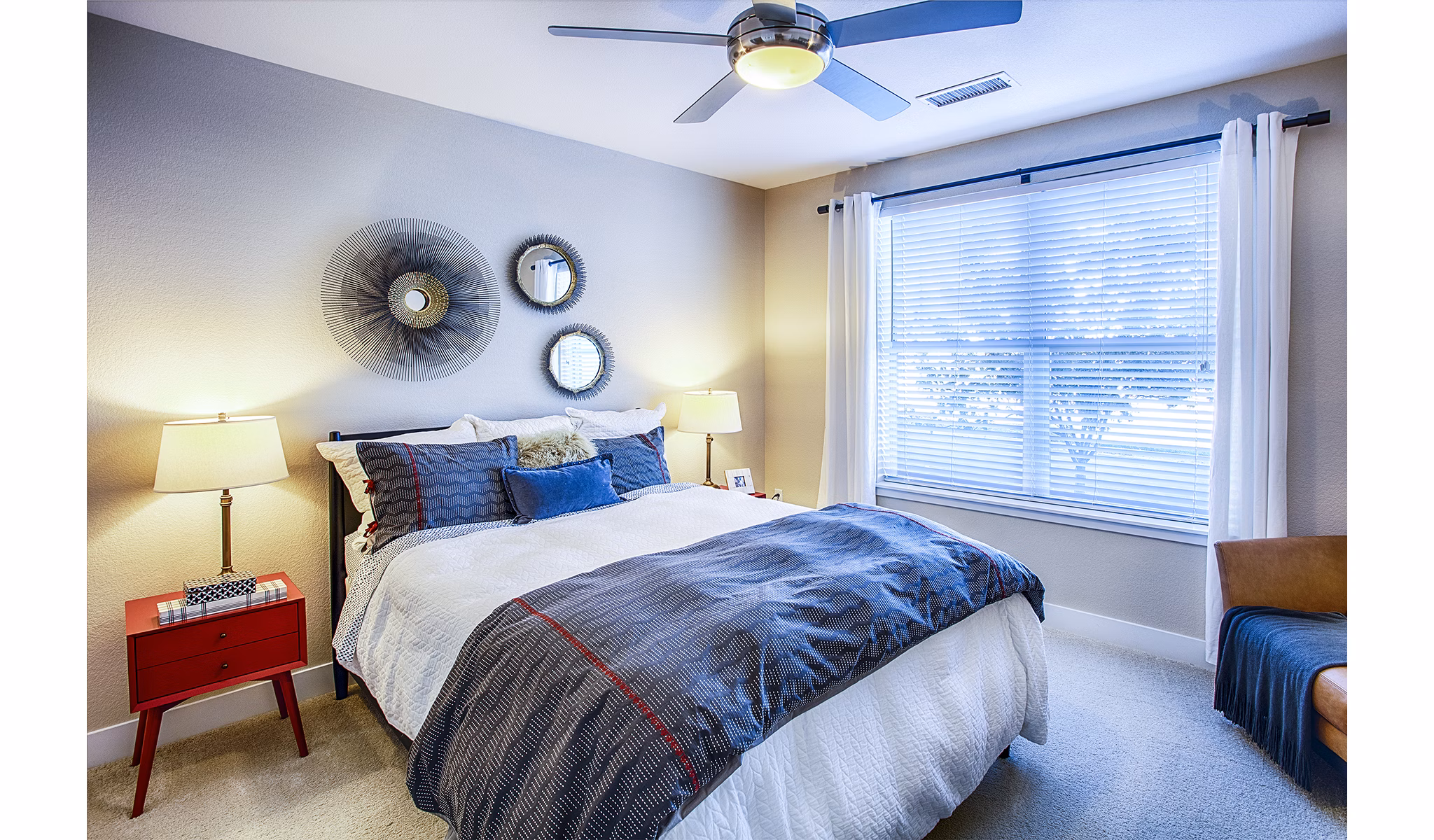 Elegant bedroom with modern furnishings at RockVue Apartments in Broomfield