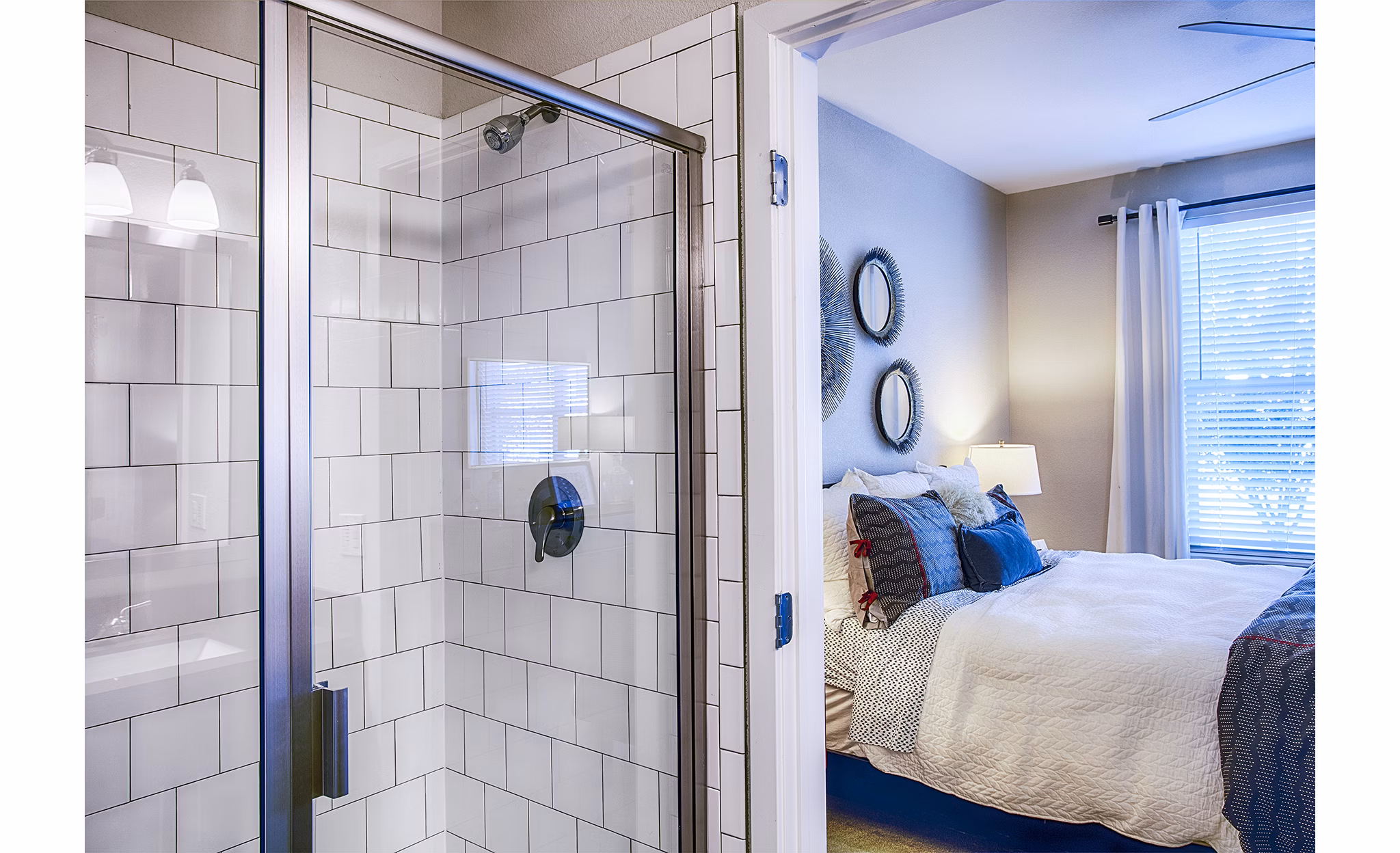 Elegant bedroom and bathroom entrance at RockVue Apartments, luxury living near Boulder
