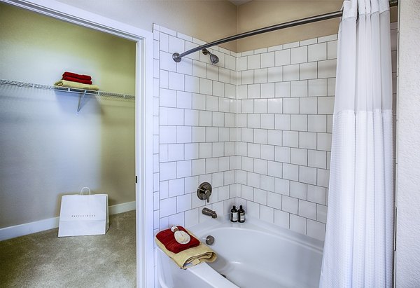 Luxurious bathroom featuring marble countertops and modern fixtures at RockVue Apartments in Broomfield, Colorado